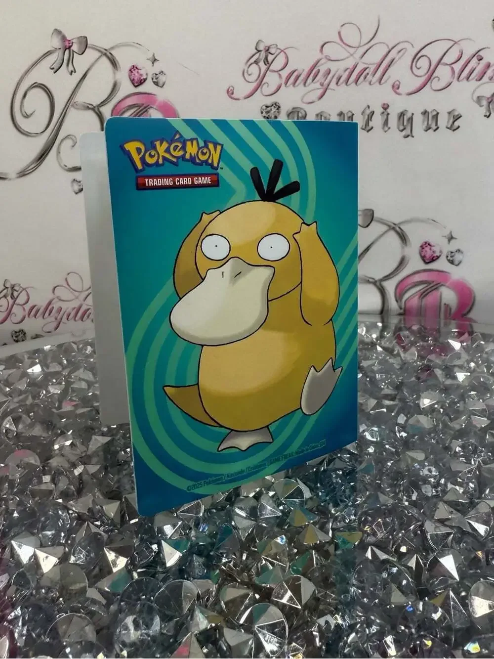 Pokemon trading card book Gray Duck Card Binder with Teal/Blue Swirl Background